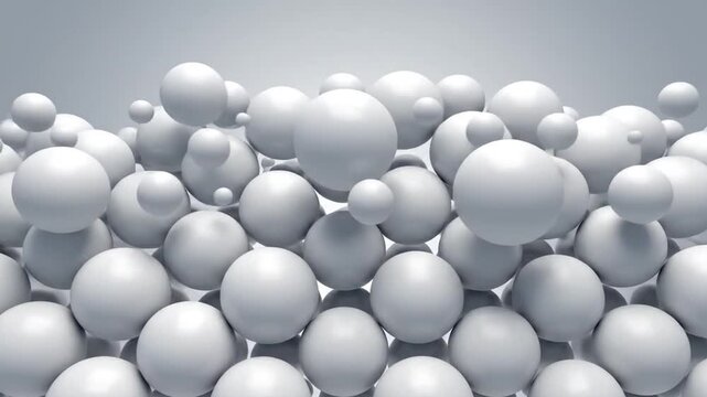 Numerous white glossy spheres float and stack in an abstract arrangement
