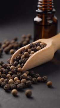 Elegant product-style video featuring a decorative bottle of black pepper essential oil with