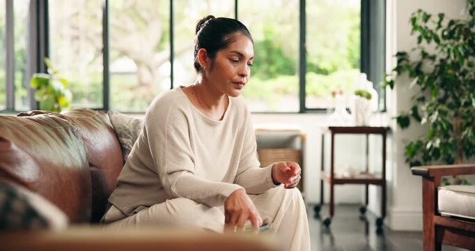 Woman, phone and stress with headache on sofa for online dating, ghosting or angry in living room. Person, frustrated and migraine with smartphone, vertigo and mobile app for social network at house