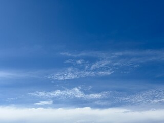 clear blue sky with pure white clouds. The sky was very clear and clouds were scattered everywhere