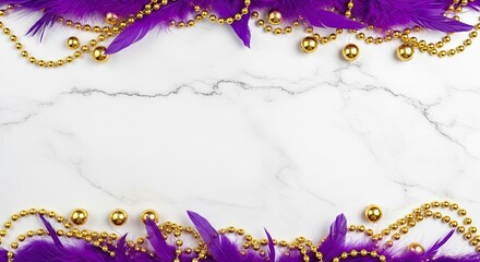Purple and gold beads and feathers on a marble background.