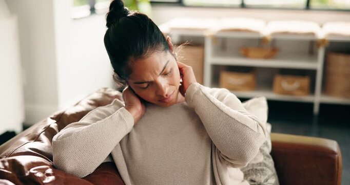 Stress, woman and massage neck pain on sofa for muscle cramp, stiffness and pinched nerve. Discomfort, female person or stretching to relieve joint ache, shoulder inflammation or poor posture in home