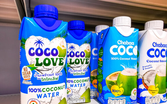 Coconut water Coconut bottles drinks products on the shelf Thailand.