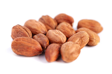 Fototapeta premium Hazelnuts kernels on a white background, healthy food. Macro