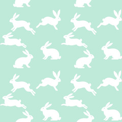 Seamless repeating pattern with white bunny rabbit silhouettes on a mint pastel background. Minimal spring and Easter design for textile, fabric, wallpaper, wrapping paper and nursery decor.