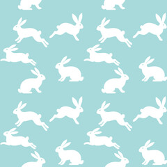 Seamless repeat pattern featuring white bunny silhouettes on a soft aqua blue background. Clean Easter and spring animal print for textiles, wallpaper, packaging and stationery.