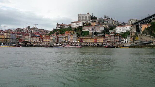 Low Angle Drone Dolly In Along Douro River in Porto
