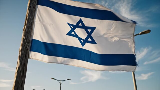 Israeli flag waving in sky