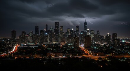 Obraz premium Dramatic cityscape at night with lightning strikes illuminating the skyline