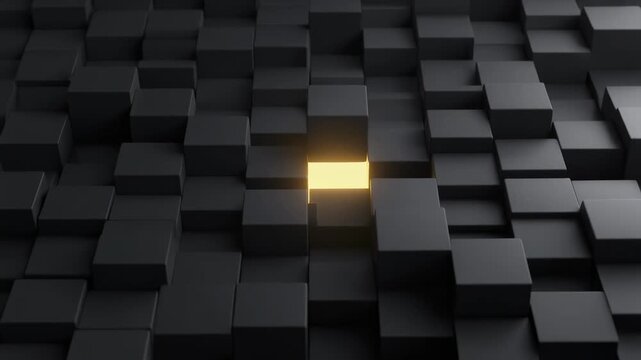 Abstract black cubes with glowing golden light shining through one cube in a modern technology concept