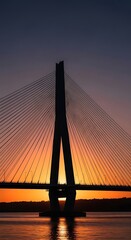Fototapeta premium Cable-stayed bridge at sunset silhouette.