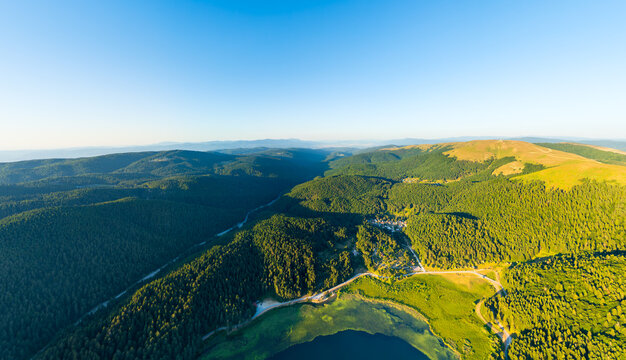 Bolu, Turkey. Abant - Large freshwater lake surrounded by mountains and forest with picturesque views. Sunset time. Summer landscape. Aerial view