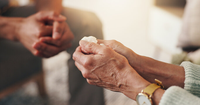 Hands, tissue and woman in therapy, mental health and sad with consultation for grief in office. Person with depression, counseling and psychologist with loss, trauma and help with paper wipe