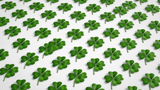 Seamless Pattern of Green Four Leaf Clovers on a White Background Symbolizing Luck and St Patrick's Day Celebration