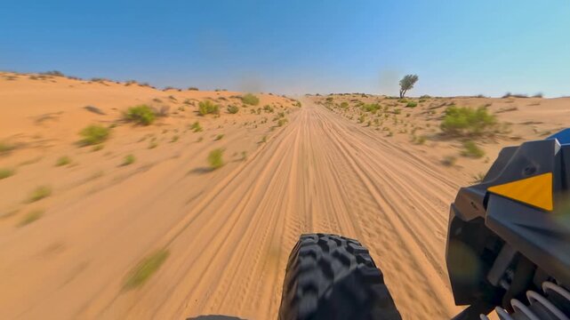 Close Up Shot Of Tire And Suspension On A Dune Buggy Driving Through A Desert At High Speed.