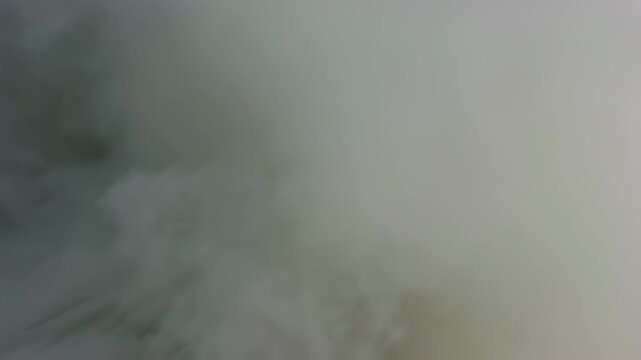 A wispy, grayscale depiction, featuring swirling, gaseous formations