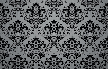 Wallpaper in the style of Baroque. Gray and black floral ornament. Seamless vector background. Graphic pattern for fabric, wallpaper, packaging. Ornate Damask flower illustration