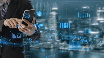 Fototapeta premium A business professional interacts with a smartphone amidst a stunning urban backdrop, showcasing digital graphs and analytics for data-driven decision-making. Xenic