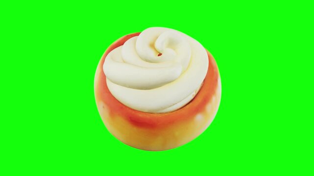 3D Cinnamon roll. Spiral swirl bun, pastry with sweet cream icing animated on green screen background