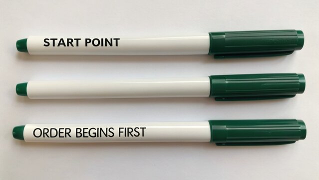 Three Identical Green and White Markers Aligned Vertically