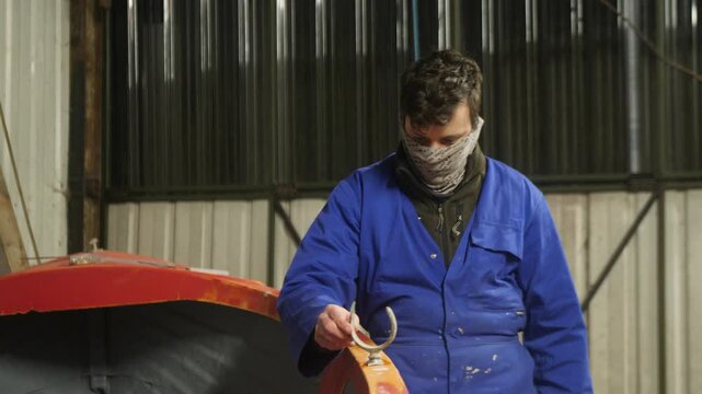 Fitting oarlock to repaired boat satisfied thumbs up