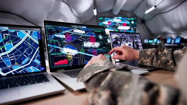 Military Analyst Strategizing War Operations With Laptop