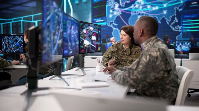 Military Control Center With Soldiers Monitoring Maps