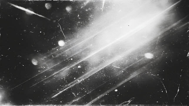 retro film overlay effect with scratch dust and bokeh light leaks,retro grain noisy film distressed light leak flare on black background,black and white abstract background,Abstract old film texture