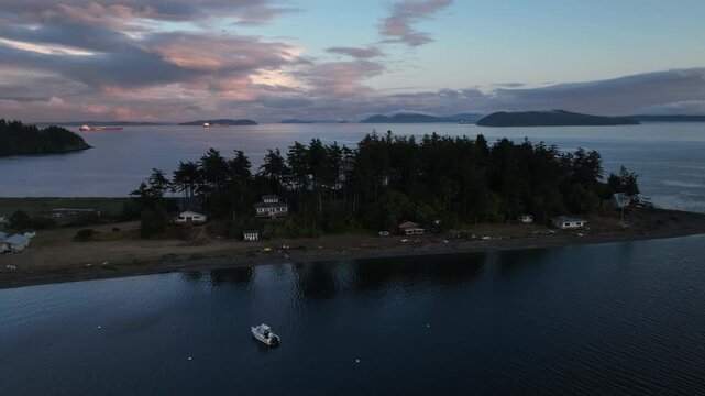 Rotating Aerial Hyperlapse at Sunset Over Eliza Island and San Juan Islands Washington