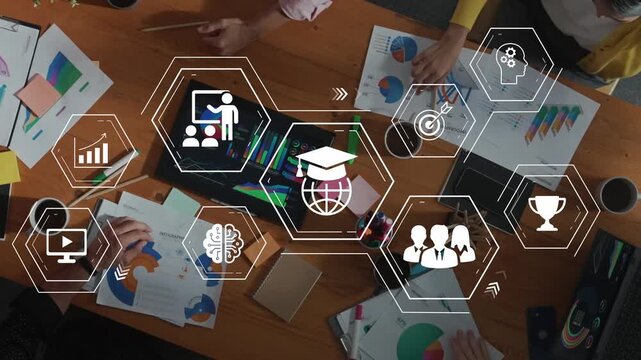 Collaborative learning session with diverse individuals brainstorming ideas using technology and visual aids in a modern workspace environment Gluon.