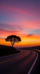 Lonely Tree on Winding Road at Sunset.