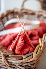 Obraz premium Knitting project with yarn needles and measuring tape