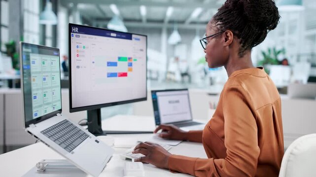 HR Manager Using Cloud Software Platform For Managing Staff