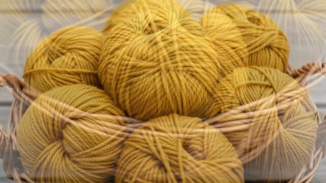 Cozy Yarn Balls in Wicker Basket on Wooden Surface for Warmth and Crafting Creativity