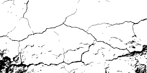 Obraz premium High-contrast black and white image of cracked dry earth, deep jagged fissures spreading across a barren surface, creating a dramatic and textured natural background.