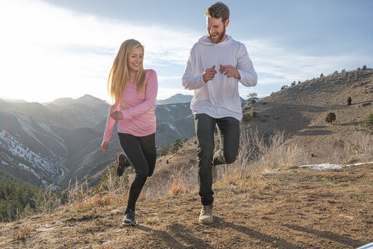 Couple having fun on hike in mountains