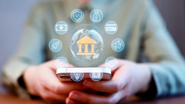 People use smartphone for online banking and financial services at home during daytime.