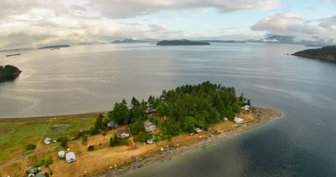 Rotating Aerial View of Eliza Island with Rainbow and San Juan Islands Washington