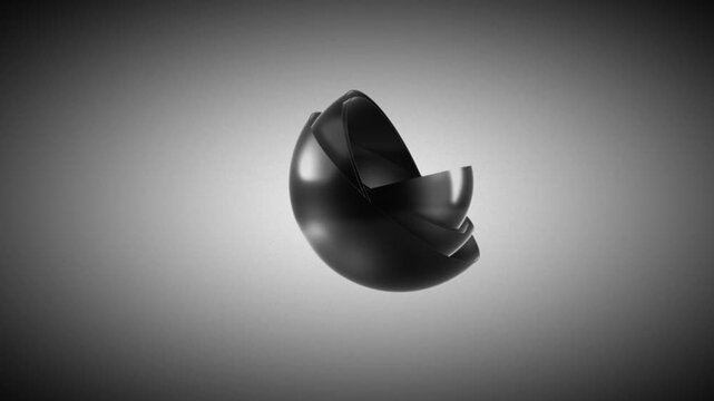 Isolated glossy black sphere with a clean futuristic design split into smooth layered sections floating over a gradient gray background
