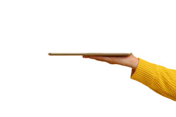 tablet held in hand against background