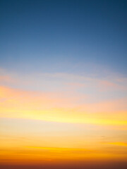 Obraz premium Sky sunset evening sunrise cloud weather dramatic landscape goldent and indigo color gradient pastel horizon, twilight yellow golden reflection morning nature environment energy ecosystem change