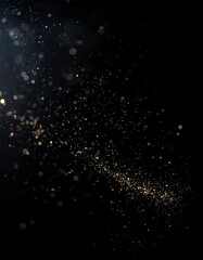 A dark background with gold particles and light