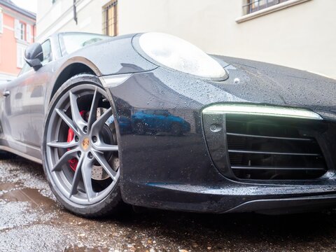 Porsche 911 Carrera 4S (991.2) sports car wet road driving luxury and engineering excellence