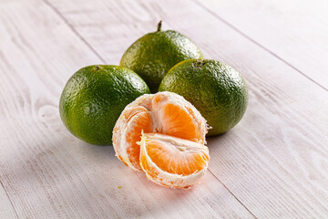 Sweet green juicy tangerin heap