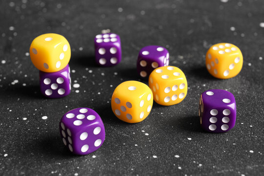 Different dices on dark background