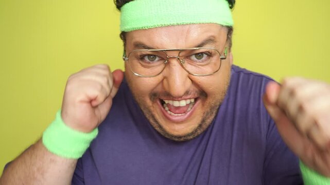 A funny fat man doing fitness. Retro style.