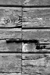 Naklejka premium Borghi toscani in bianco e nero. L'architettura medievale dei borghi toscani, caratterizzata da pietra, cotto, riflette il periodo comunale con cinte murarie, torri, vicoli stretti e piazze. Italia. 