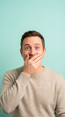 Surprised Caucasian Man Covering His Mouth On Blue Background