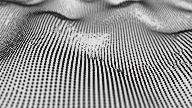 Black and white abstract image of a wavy surface composed of small, evenly spaced dots