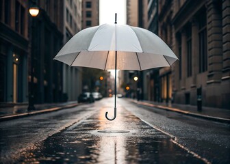 Transparent umbrella in rainy city street, moody urban weather concept
